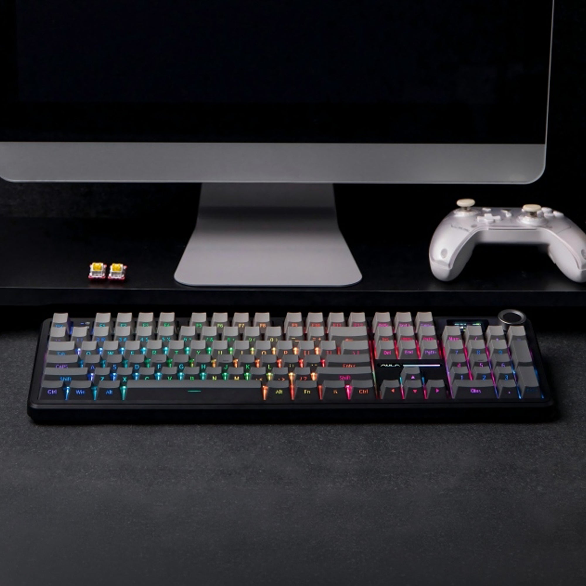 the F108 series on a clean gamers desktop with a mac suggested in the background