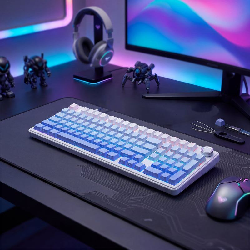 gradient blue mechanical keyboard on a coordinating blue themed gamers desk
