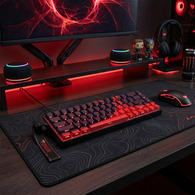 magnetic switch keyboard in "beast red" on a coordinating red and black themed gamers desk