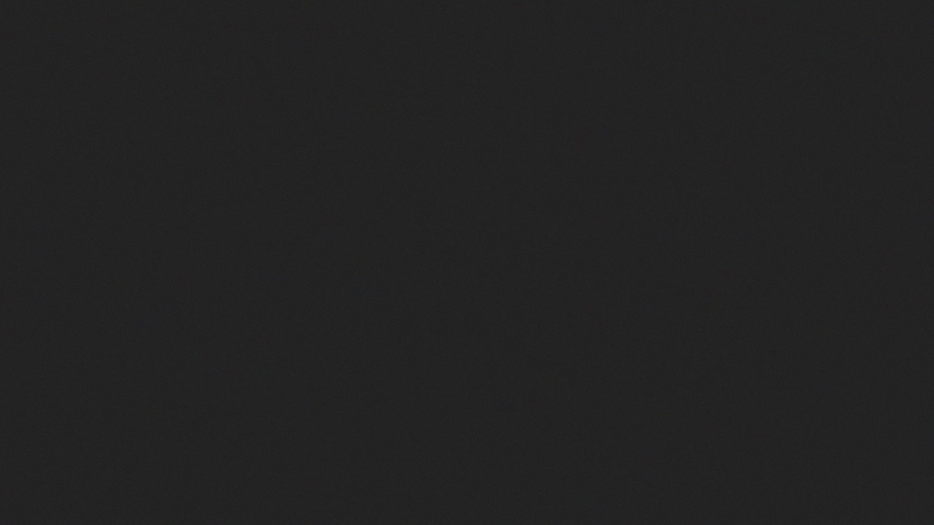 Video of a black background with a glimmery rainbow spider web that shows on the screen. The Aula logo of a white tarantula crawls up the middle of the page and then turns Blue with the Aula name showing on the bottom. 