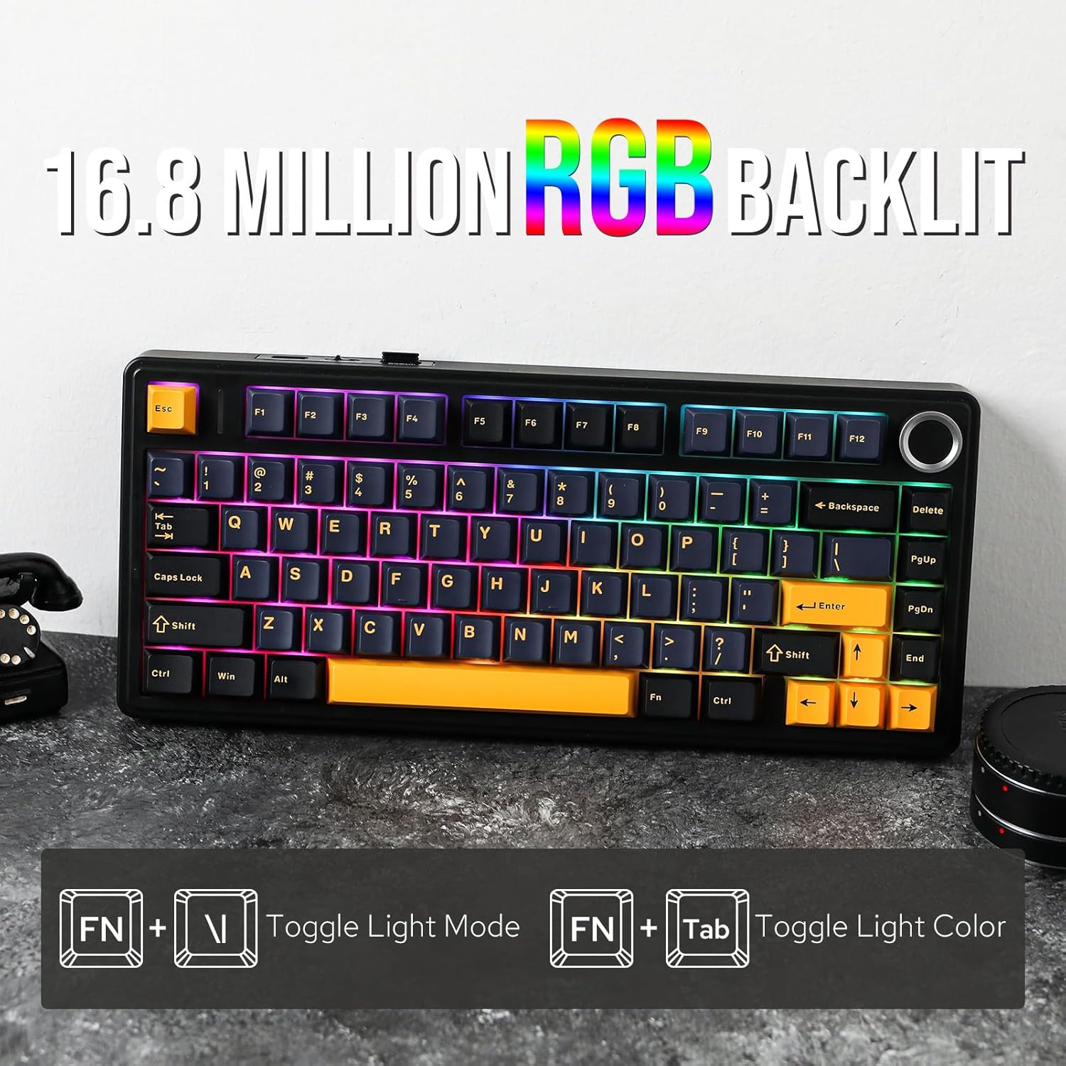 Mechanical keyboard with black keys and yellow escape key on a white background
